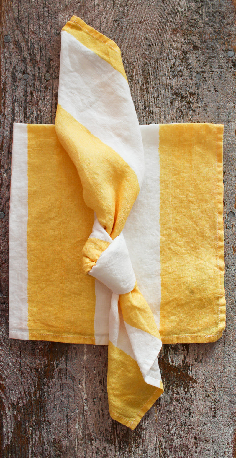 https://www.houseofcardoon.com/cdn/shop/files/Stripe_Linen_Napkin_Yellow_Twisted_800x.jpg?v=1698842189